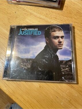 - Justified (Blue Cover) CD